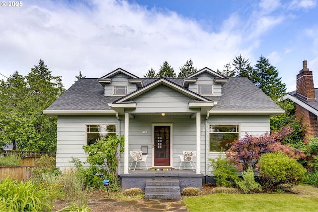 7154 N Greeley Ave, Portland, OR 97217 - bungalow with roof with shingles and a porch