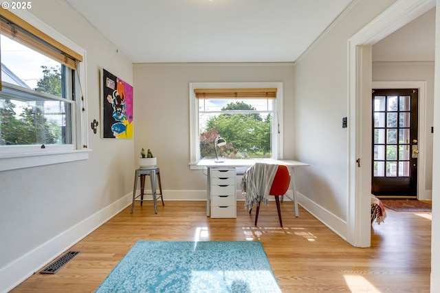 7154 N Greeley Ave, Portland, OR 97217 - office with crown molding, light wood-style floors, and baseboards