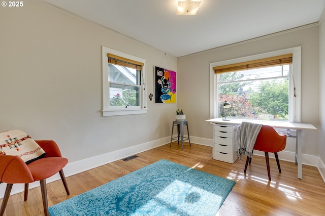 7154 N Greeley Ave, Portland, OR 97217 - office with ornamental molding, baseboards, and light wood finished floors
