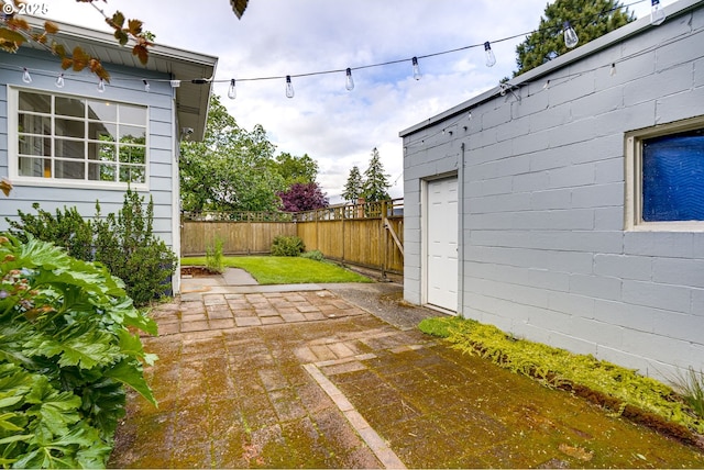 7154 N Greeley Ave, Portland, OR 97217 - fenced backyard with a patio