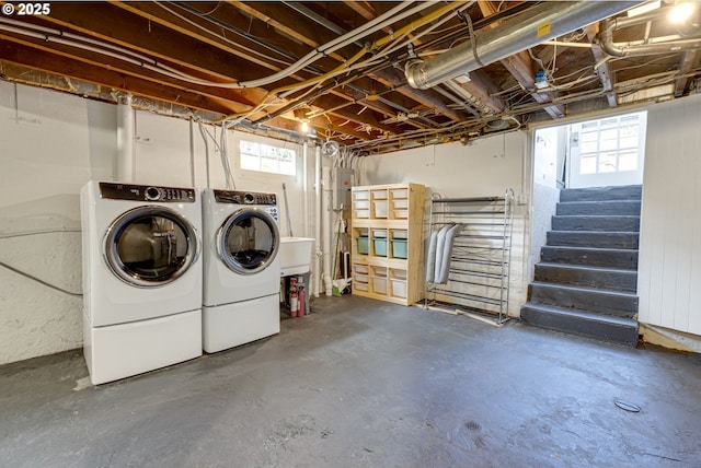 7154 N Greeley Ave, Portland, OR 97217 - basement with washing machine and clothes dryer, healthy amount of natural light, and stairway