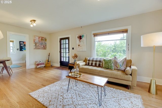 7154 N Greeley Ave, Portland, OR 97217 - living room with light wood finished floors and baseboards