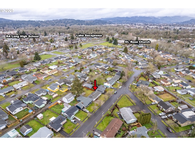 aerial view featuring a residential view and a mountain view