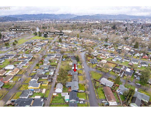 aerial view with a residential view and a mountain view