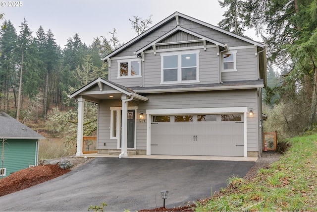 craftsman-style home featuring a garage