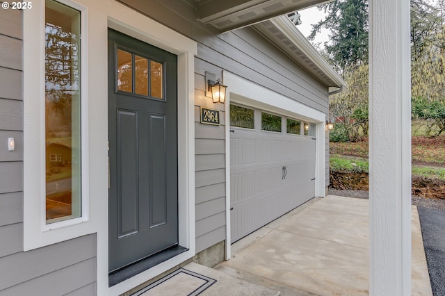 property entrance featuring a garage