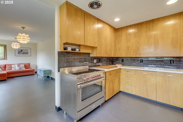 kitchen featuring decorative backsplash, finished concrete flooring, stainless steel range, and light brown cabinets