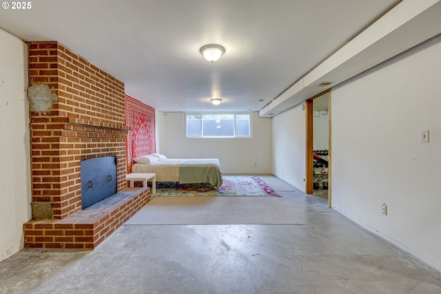 bedroom featuring a closet, unfinished concrete flooring, and visible vents