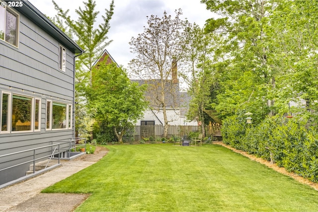 view of yard with fence