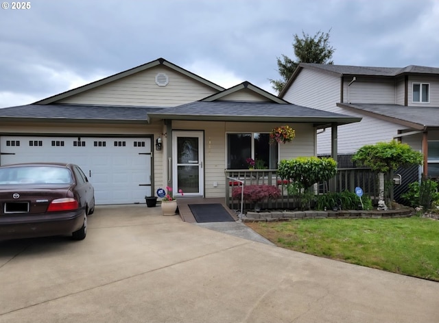 13826 SE Boise Ct, Portland, OR 97236 - view of front of house featuring concrete driveway, a porch, a garage, and roof with shingles