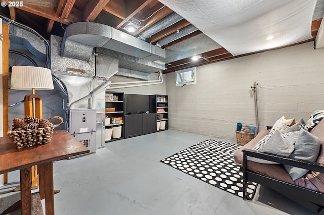 below grade area featuring heating unit
