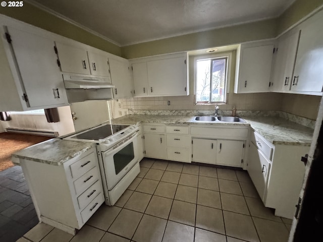 kitchen with backsplash, electric stove, under cabinet range hood, and a sink