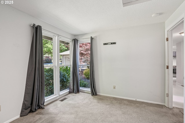 6250 SW 152nd Ave, Beaverton, OR 97007 - carpeted empty room featuring a textured ceiling
