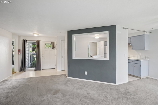 6250 SW 152nd Ave, Beaverton, OR 97007 - unfurnished living room featuring light colored carpet