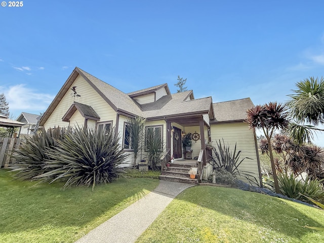 6931 Oakwood Ct, Brookings, OR 97415 - view of front facade with a front lawn and roof with shingles