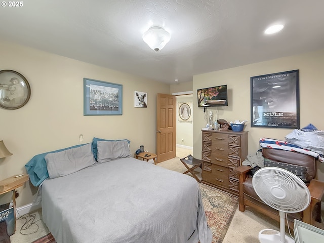6931 Oakwood Ct, Brookings, OR 97415 - bedroom with light carpet and baseboards