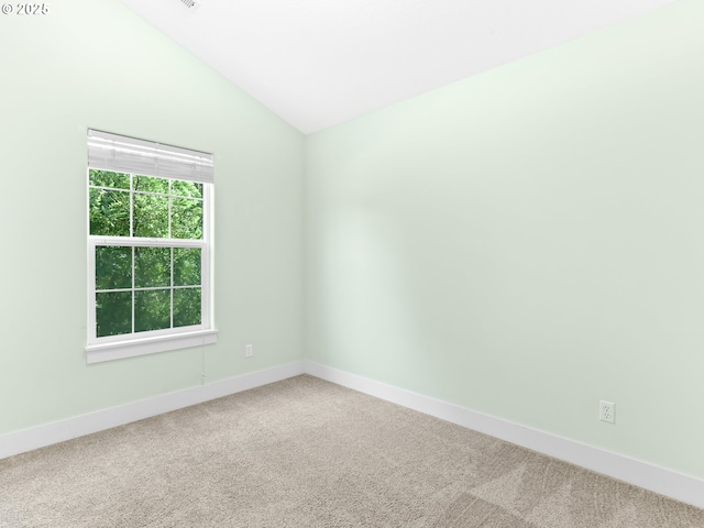 15235 SW Jasper Ln, Beaverton, OR 97007 - carpeted empty room with lofted ceiling and baseboards