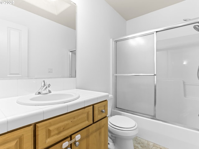 15235 SW Jasper Ln, Beaverton, OR 97007 - bathroom featuring vanity and combined bath / shower with glass door