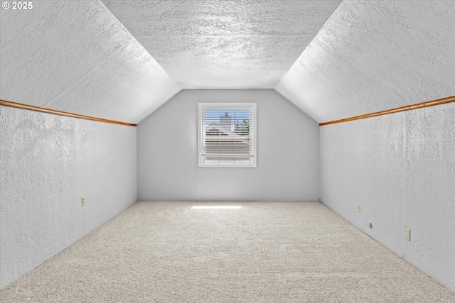 4912 N Yale St, Portland, OR 97203 - bonus room featuring a textured wall, lofted ceiling, carpet floors, and a textured ceiling