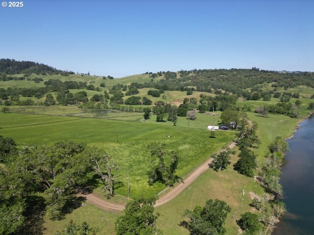 1104 Rio Nes Ln, Roseburg, OR 97470 - aerial view of property and surrounding area featuring rural landscape and a large body of water