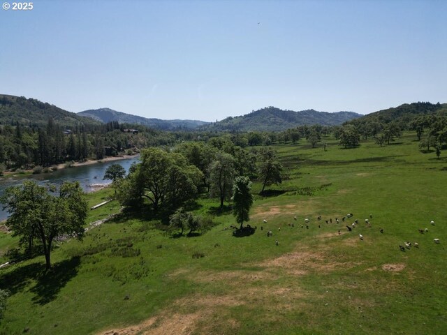 1104 Rio Nes Ln, Roseburg, OR 97470 - view of mountain backdrop featuring a large body of water