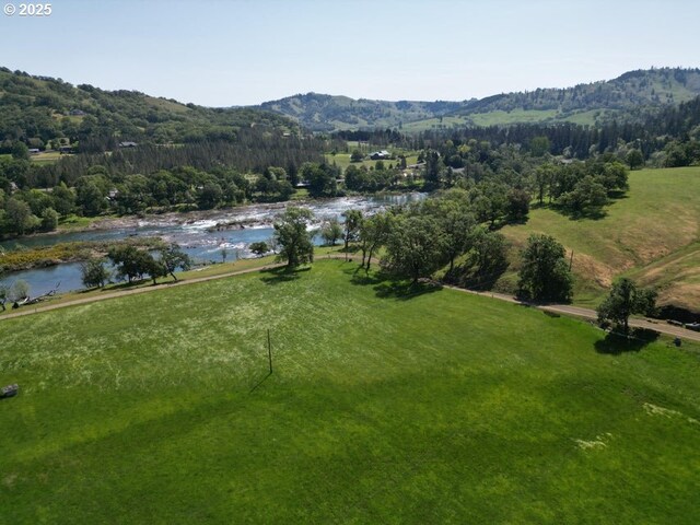1104 Rio Nes Ln, Roseburg, OR 97470 - aerial view of property and surrounding area with a water and mountain view