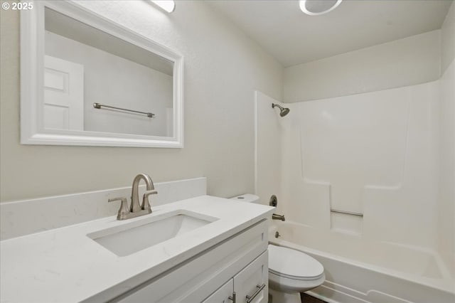 full bathroom featuring toilet, vanity, and shower / bath combination