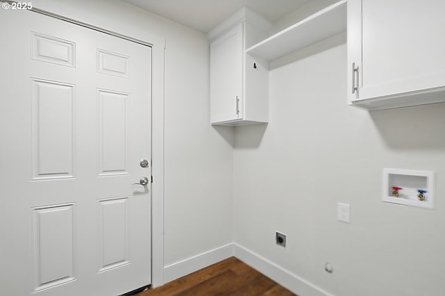 clothes washing area featuring cabinets, hookup for an electric dryer, washer hookup, and dark hardwood / wood-style floors