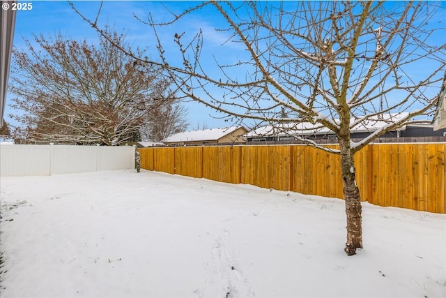 view of snowy yard