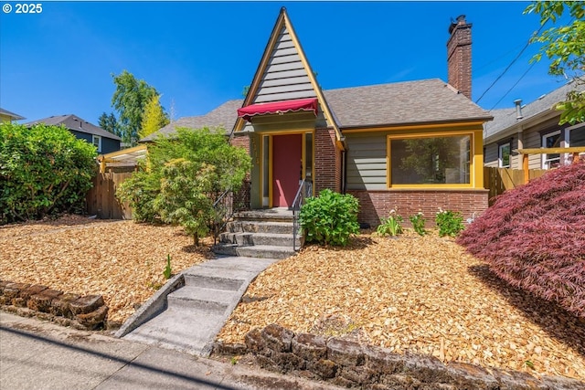 3315 SE 15th Ave, Portland, OR 97202 - view of front of home featuring brick siding, a chimney, and a shingled roof