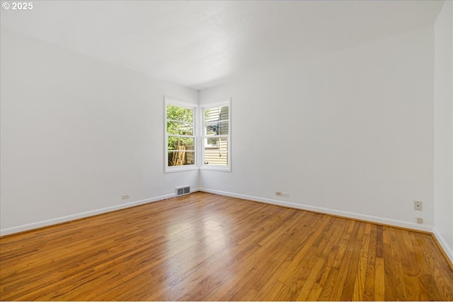 3315 SE 15th Ave, Portland, OR 97202 - spare room with baseboards and light wood-style flooring