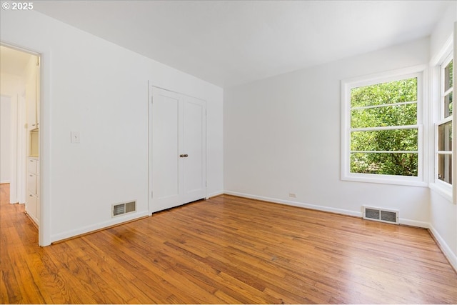 3315 SE 15th Ave, Portland, OR 97202 - unfurnished bedroom featuring light wood-style floors and baseboards