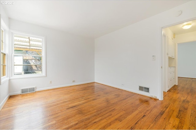 3315 SE 15th Ave, Portland, OR 97202 - unfurnished room featuring light wood-style flooring and baseboards