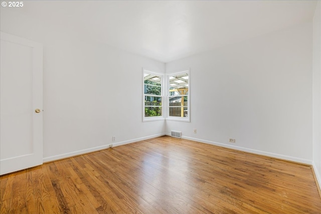 3315 SE 15th Ave, Portland, OR 97202 - spare room featuring wood finished floors and baseboards
