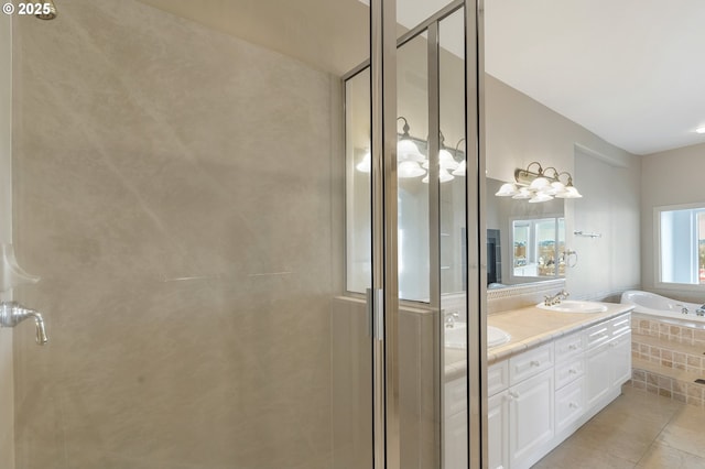 bathroom featuring tile patterned flooring, vanity, and plus walk in shower