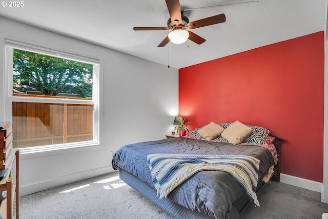 8458 SW Mohawk St, Tualatin, OR 97062 - bedroom with carpet flooring, baseboards, and a ceiling fan