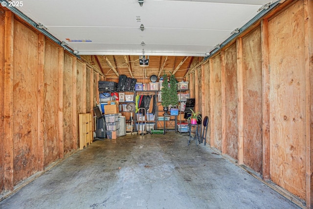 8458 SW Mohawk St, Tualatin, OR 97062 - garage featuring a garage door opener