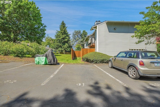 8458 SW Mohawk St, Tualatin, OR 97062 - view of side of property featuring uncovered parking and a chimney