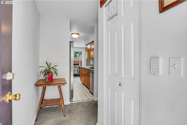 8458 SW Mohawk St, Tualatin, OR 97062 - hallway with light colored carpet and baseboards