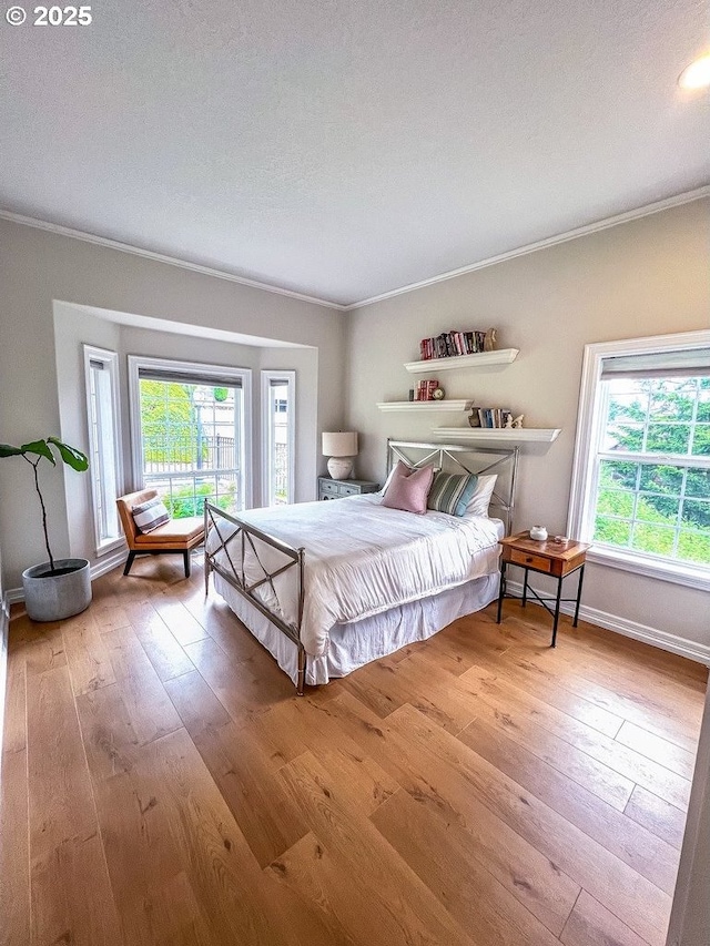 1500 SW Miller Ct, Gresham, OR 97080 - bedroom with ornamental molding, hardwood / wood-style floors, and baseboards