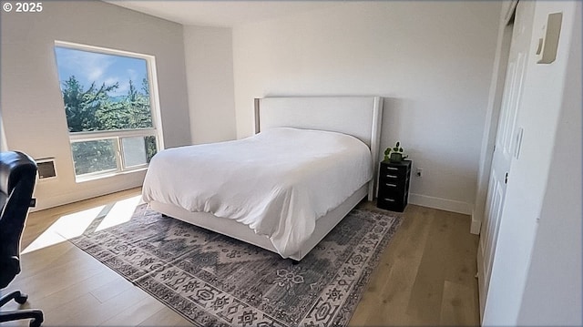 1500 SW Miller Ct, Gresham, OR 97080 - bedroom with wood finished floors and baseboards