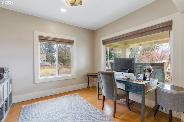 office space with light hardwood / wood-style flooring