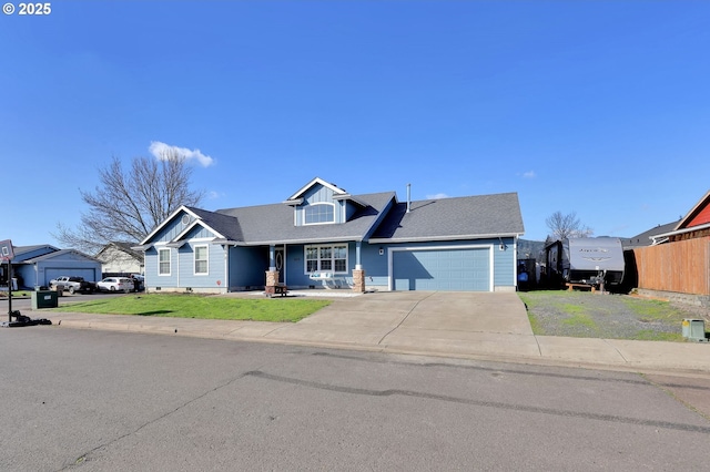 view of front facade featuring driveway, a garage, and a front lawn