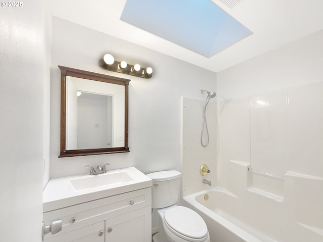 bathroom featuring  shower combination, vanity, and toilet