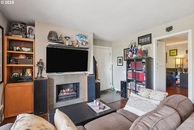 7522 SW Barnes Rd Unit E, Portland, OR 97225 - living area featuring wood finished floors and a fireplace