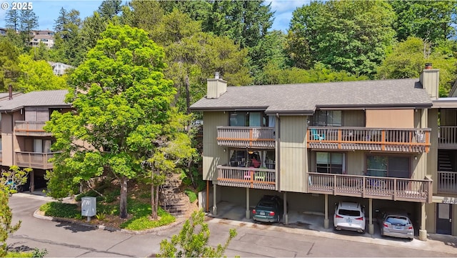 7522 SW Barnes Rd Unit E, Portland, OR 97225 - view of property featuring covered parking