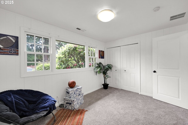 996 Lariat Dr, Eugene, OR 97401 - living area with healthy amount of natural light and carpet floors