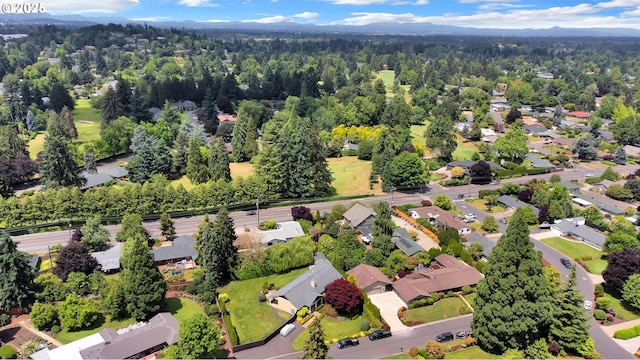 996 Lariat Dr, Eugene, OR 97401 - aerial perspective of suburban area with a heavily wooded area