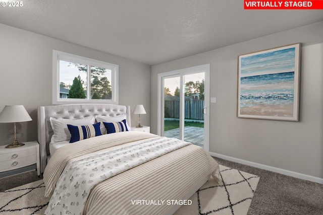 bedroom featuring carpet floors and access to outside