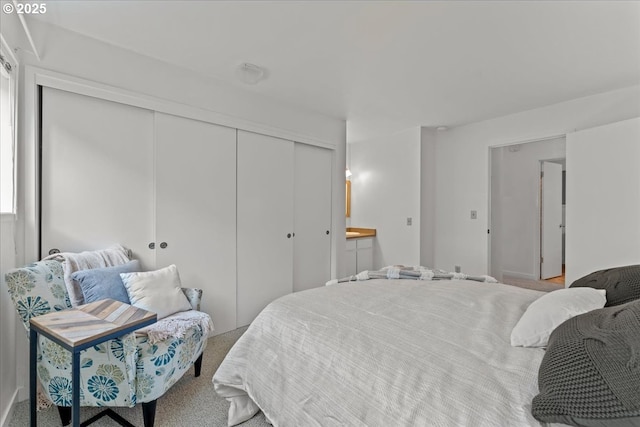5858 S Riveridge Ln Unit 24, Portland, OR 97239 - bedroom with a closet and carpet